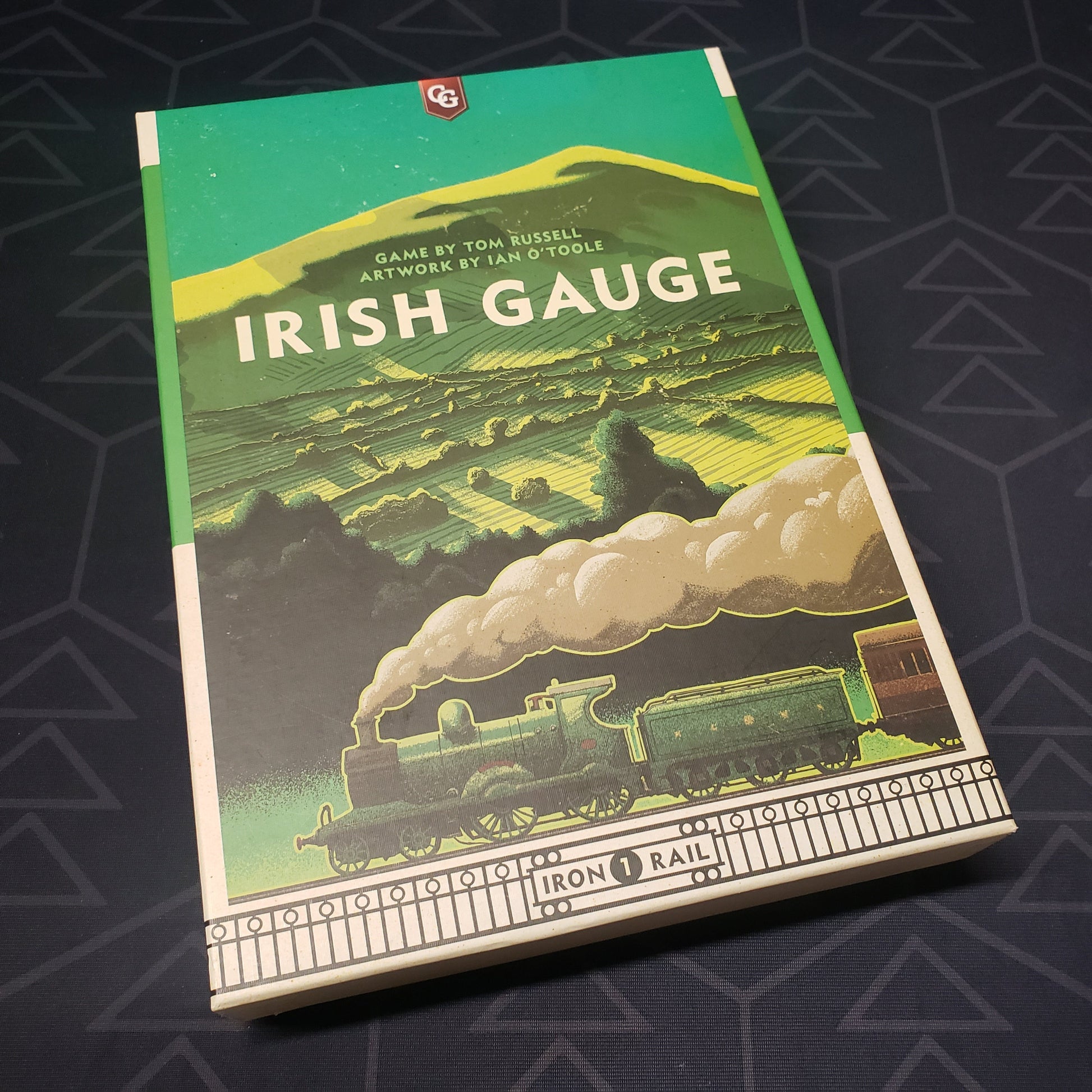 Image shows the front cover of the box for the Irish Gauge board game