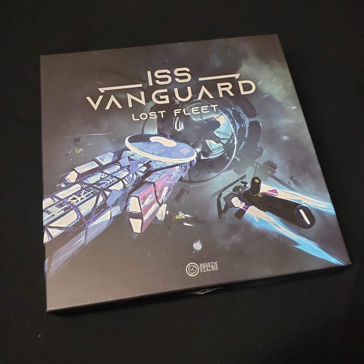 Image shows the front cover of the box of the Lost Fleet expansion for the board game ISS Vanguard