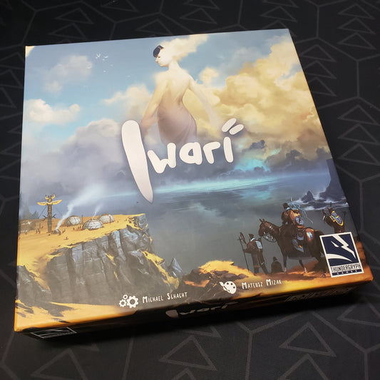 Image shows the front cover of the box for the Iwari board game