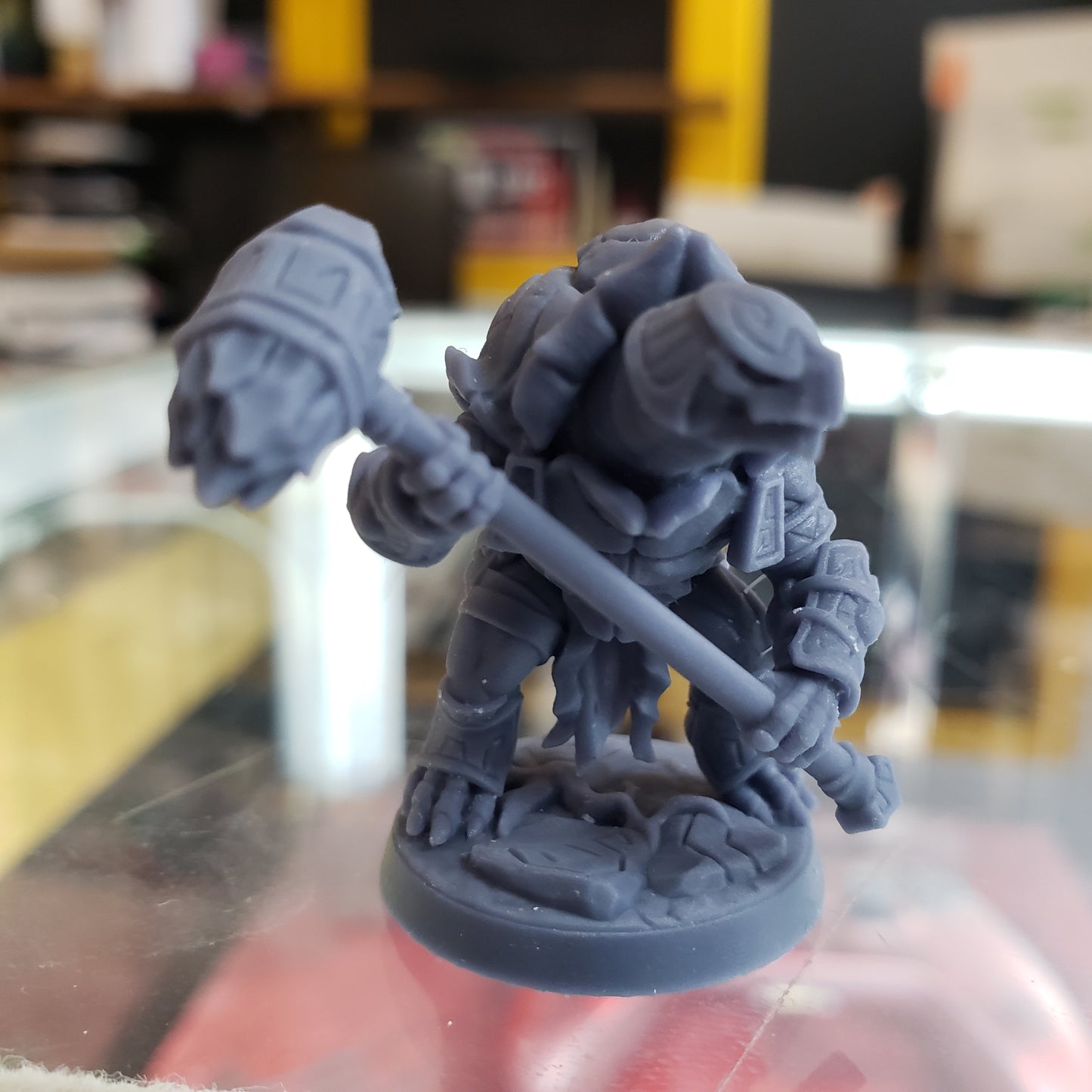 Image shows an example of a 3D printed turtle warrior gaming miniature printed in-house at All Systems Go