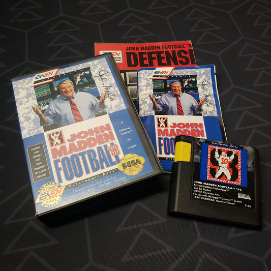 Image shows the case, manual, poster and cartridge for the video game John Madden Football '93 for Sega Genesis