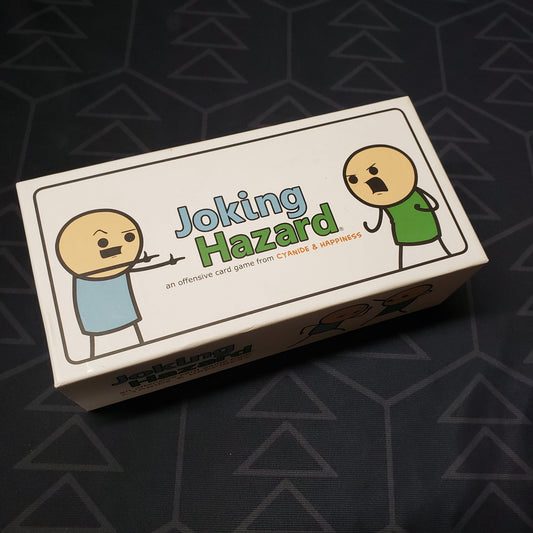 Image shows the front cover of the box for the Joking Hazard card game