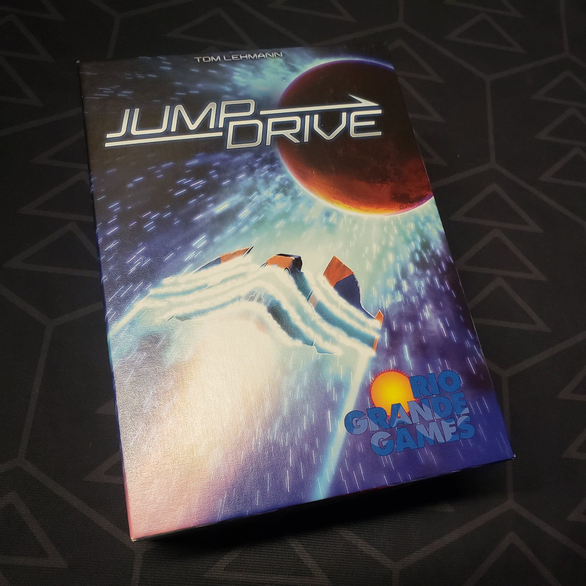 Image shows the front cover of the box for the Jump Drive card game