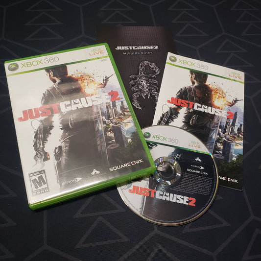 Image shows the case, manual and disc for the video game Just Cause 2 for Xbox 360