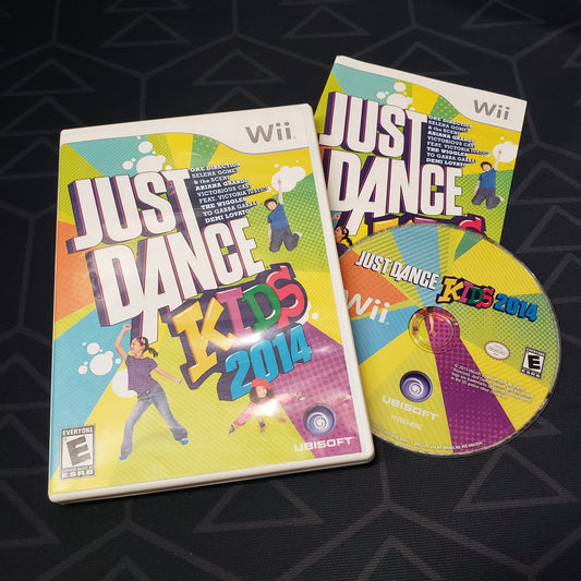 Image shows the case, manual and disc for the video game Just Dance Kids 2014 for Nintendo Wii