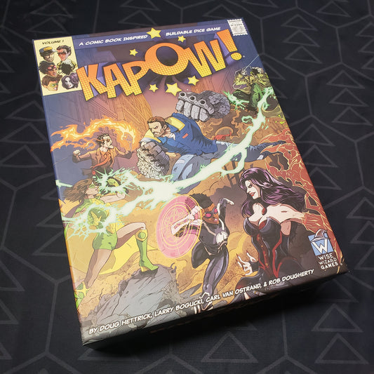 Image shows the front cover of the box for the KAPOW!: Volume 1 board game