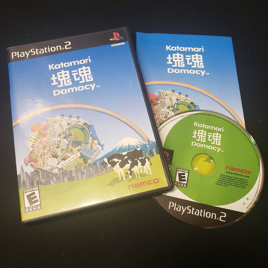 Image shows the case, disc and manual for the PS2 game Katamari Damacy