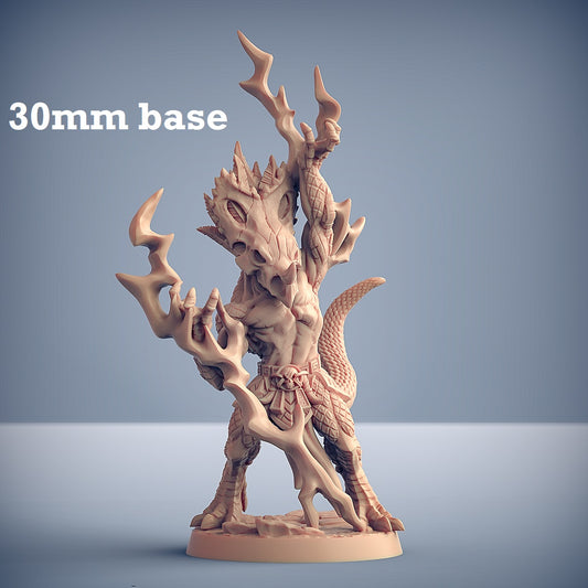 Image shows a 3D render of a lizardfolk shaman gaming miniature.