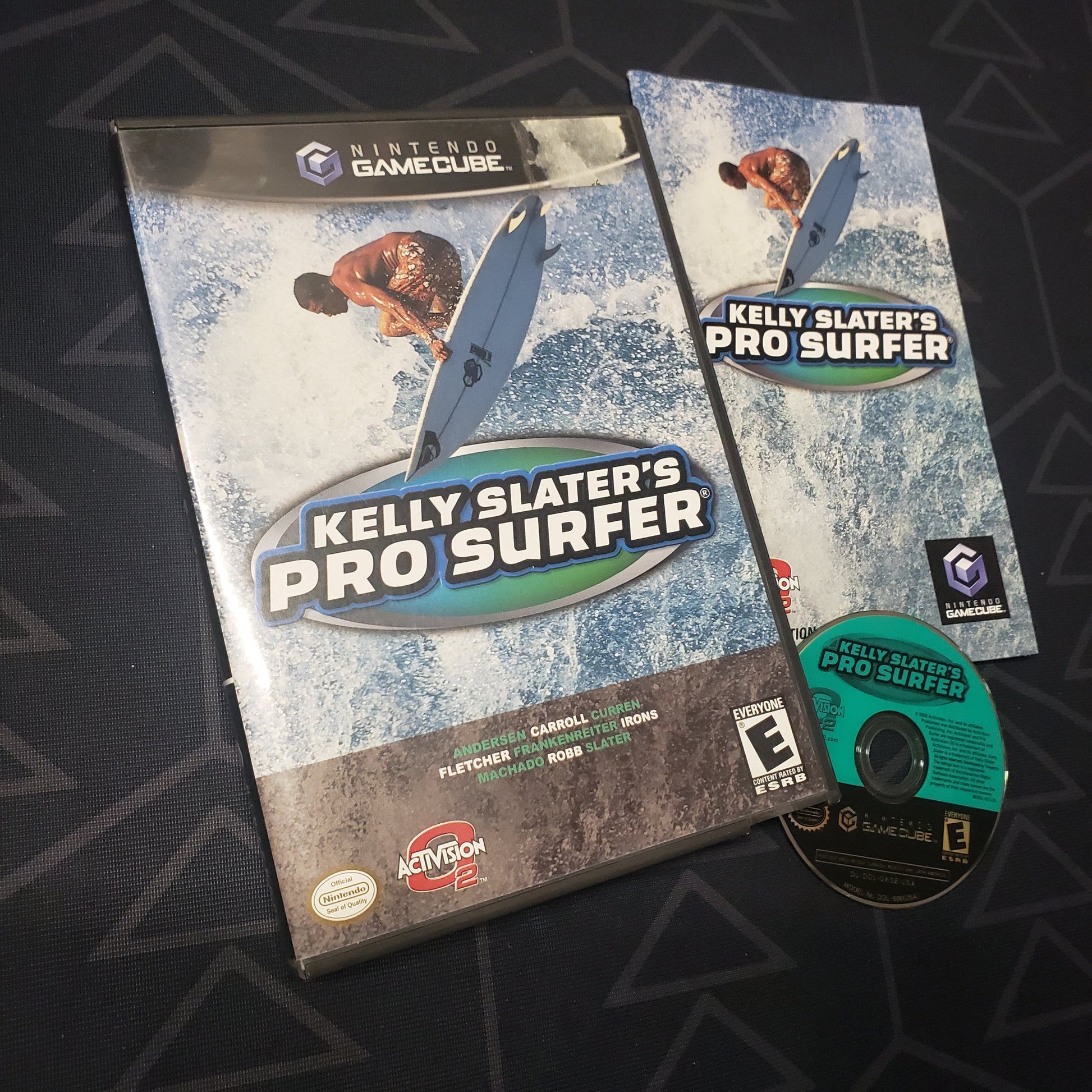 Image shows the case, manual and disc for the video game Kelly Slater's Pro Surfer for Nintendo GameCube