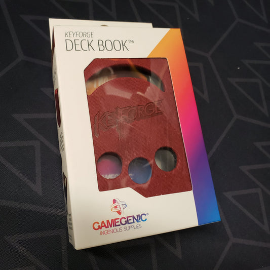 Image shows the front of the package for the red Keyforge Deck Book deck box