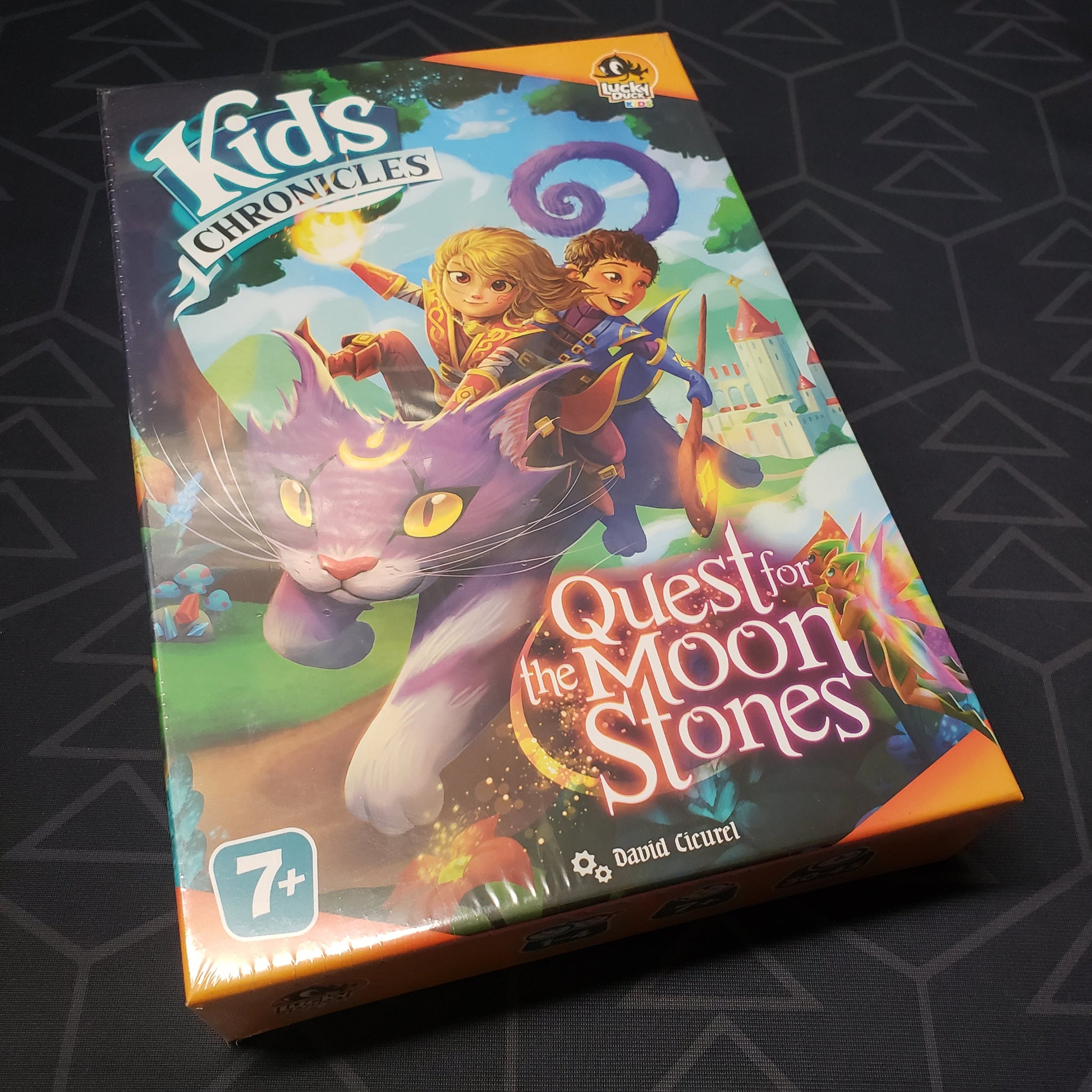 Image shows the front cover of the box for the Kids Chronicles: Quest for the Moon Stones board game