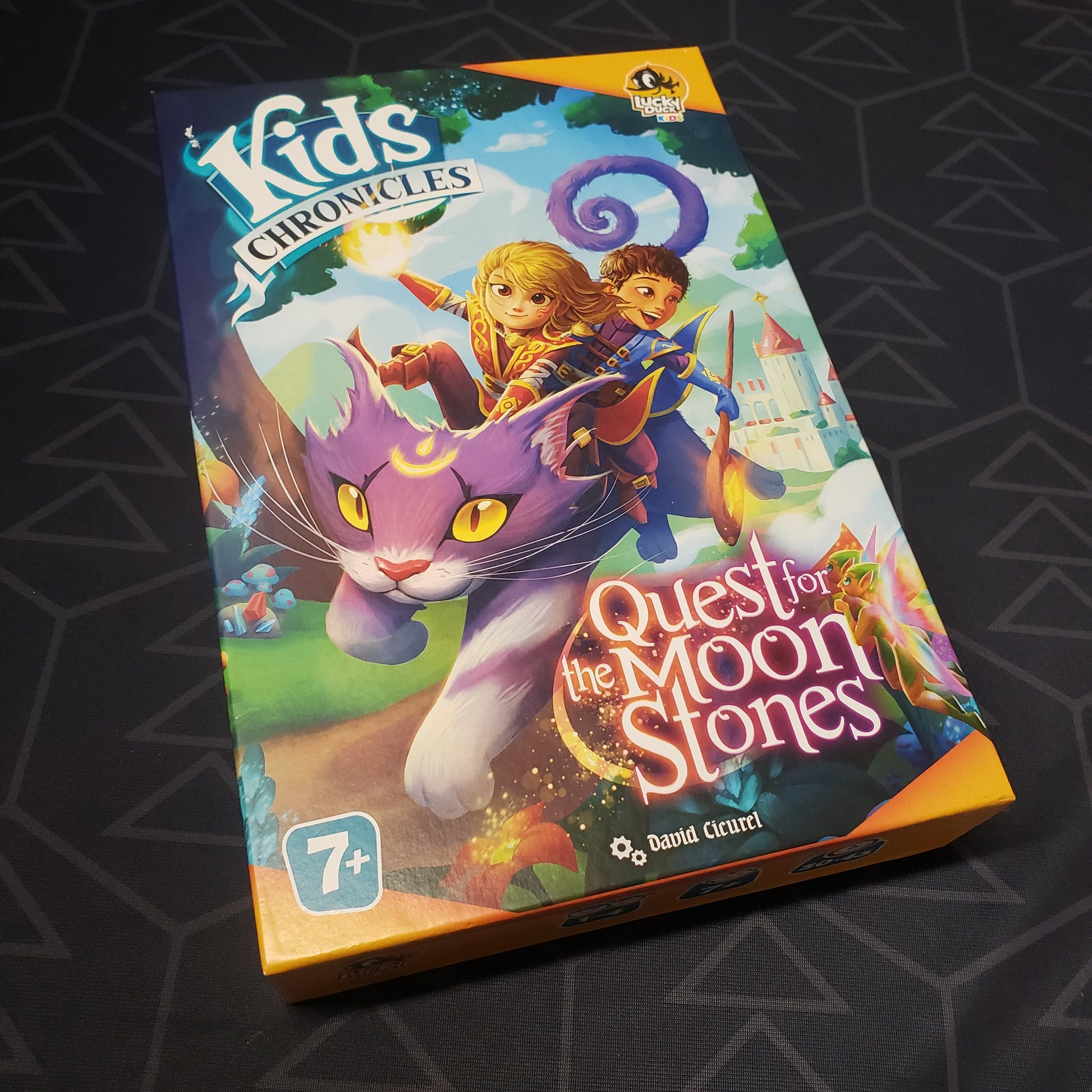 Image shows the front cover of the box for the Kids Chronicles: Quest for the Moon Stones board game
