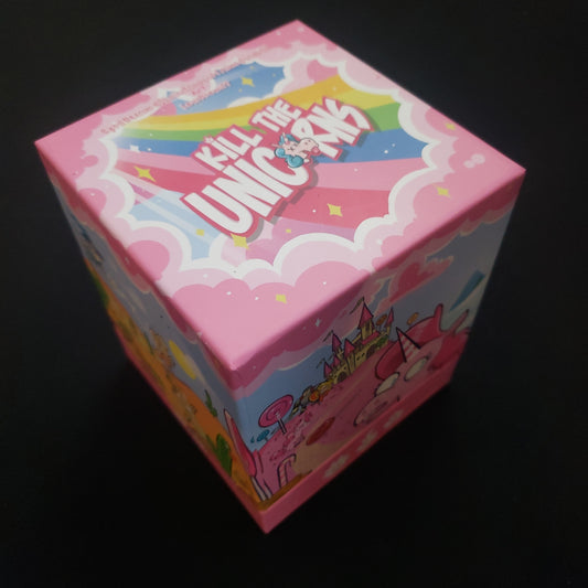 Image shows the front cover of the box of the Kill the Unicorns card game