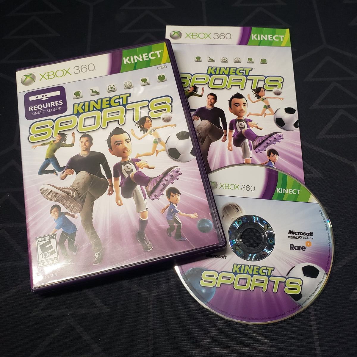 Image shows the case, manual and disc for the video game Kinect Sports for Xbox 360