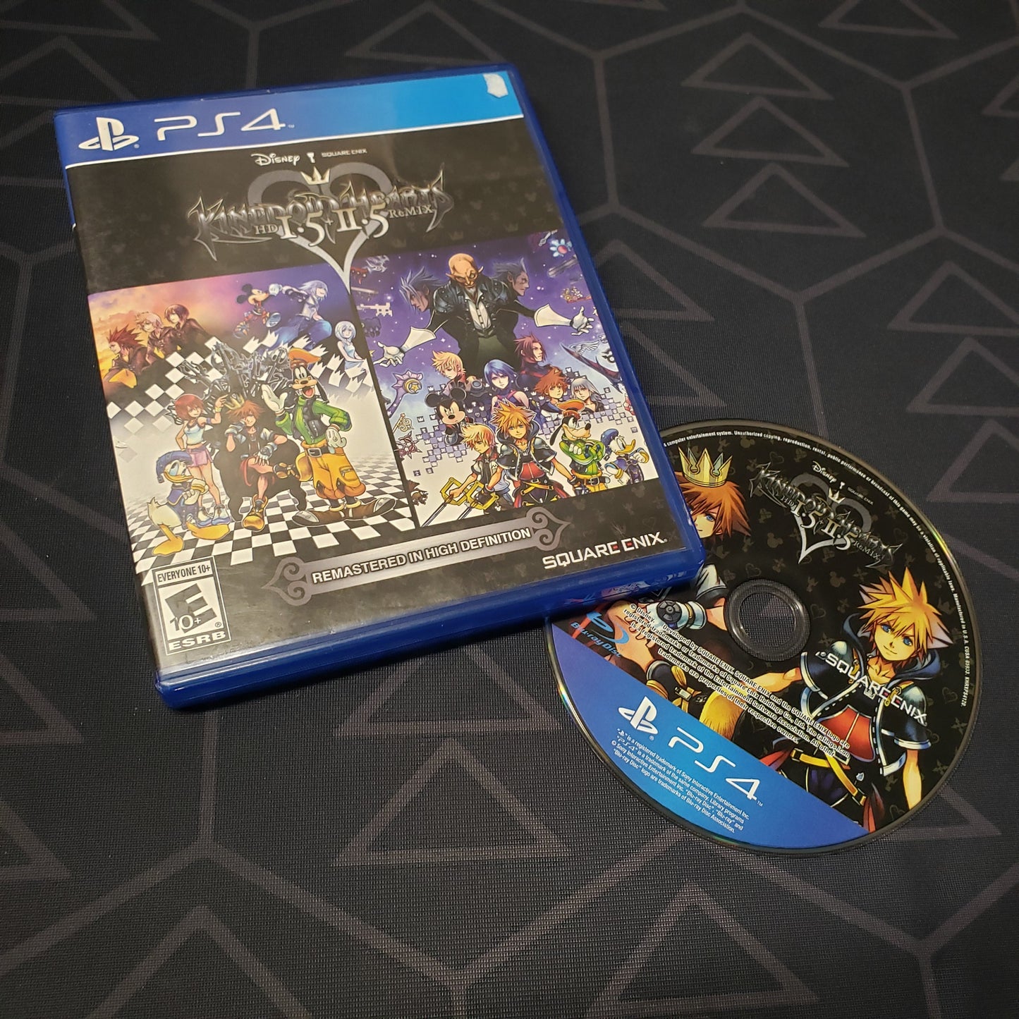 Image shows the case and disc for the video game Kingdom Hearts HD I.5 + II.5 ReMix for Playstation 4