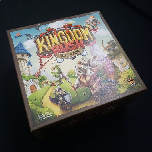 Image shows the front cover of the box of the Kingdom Rush: Rift in Time board game