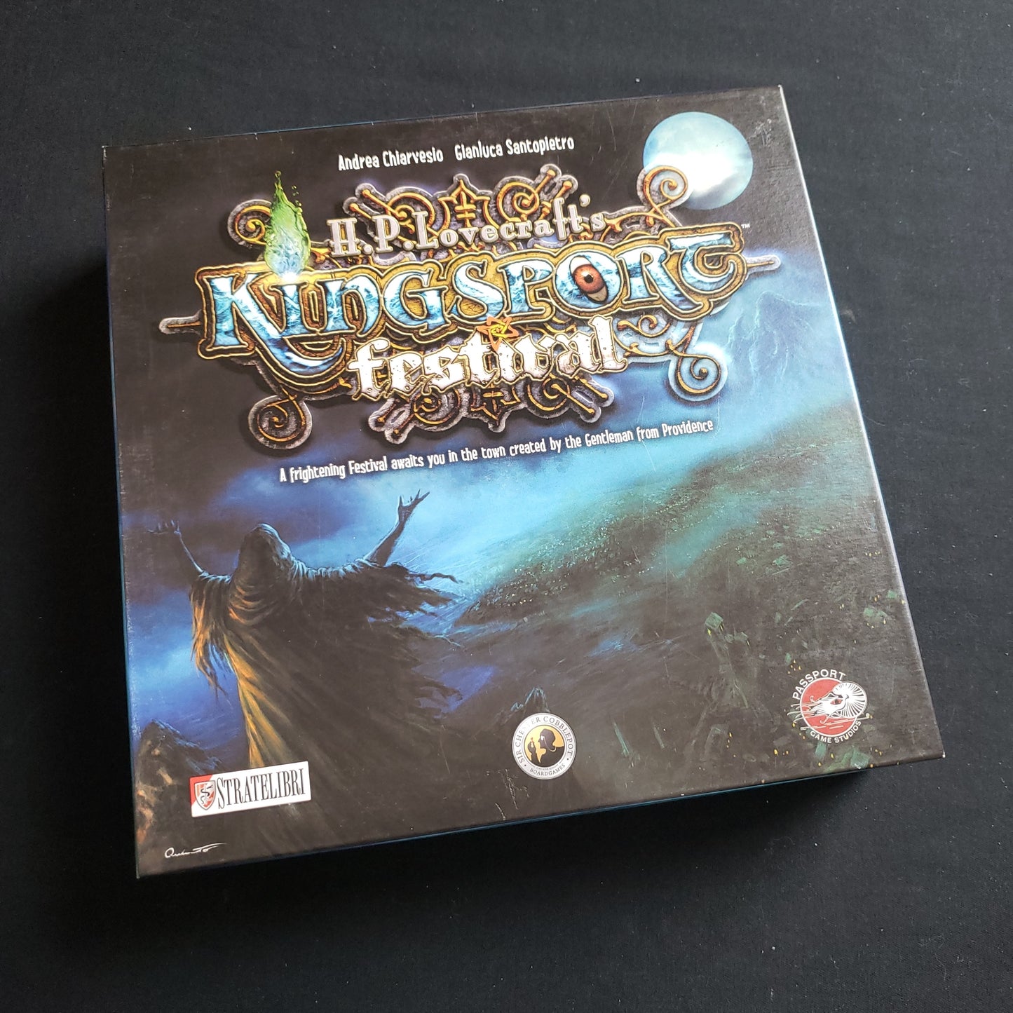 Image shows the front cover of the box of the Kingsport Festival board game