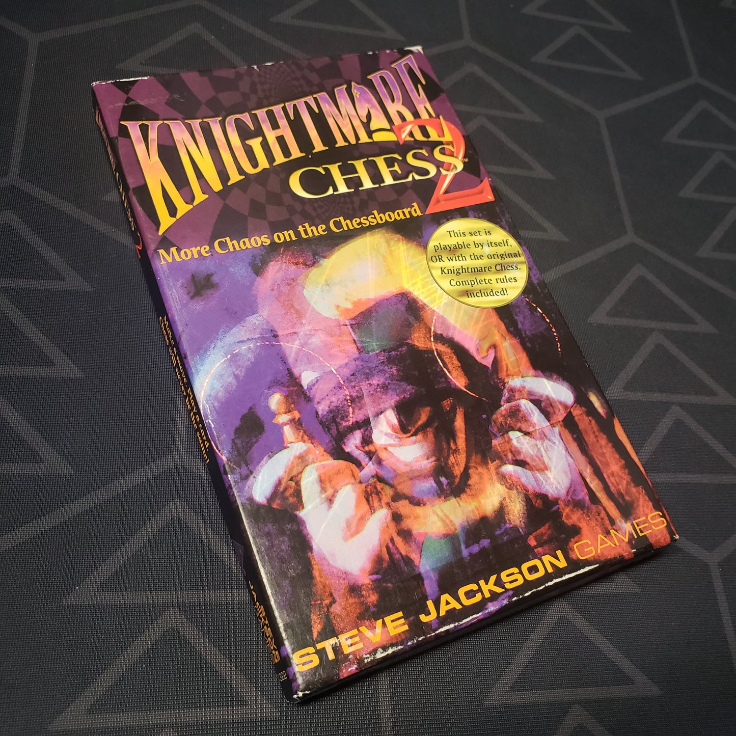 Image shows the front cover of the box for the Knightmare Chess 2 board game