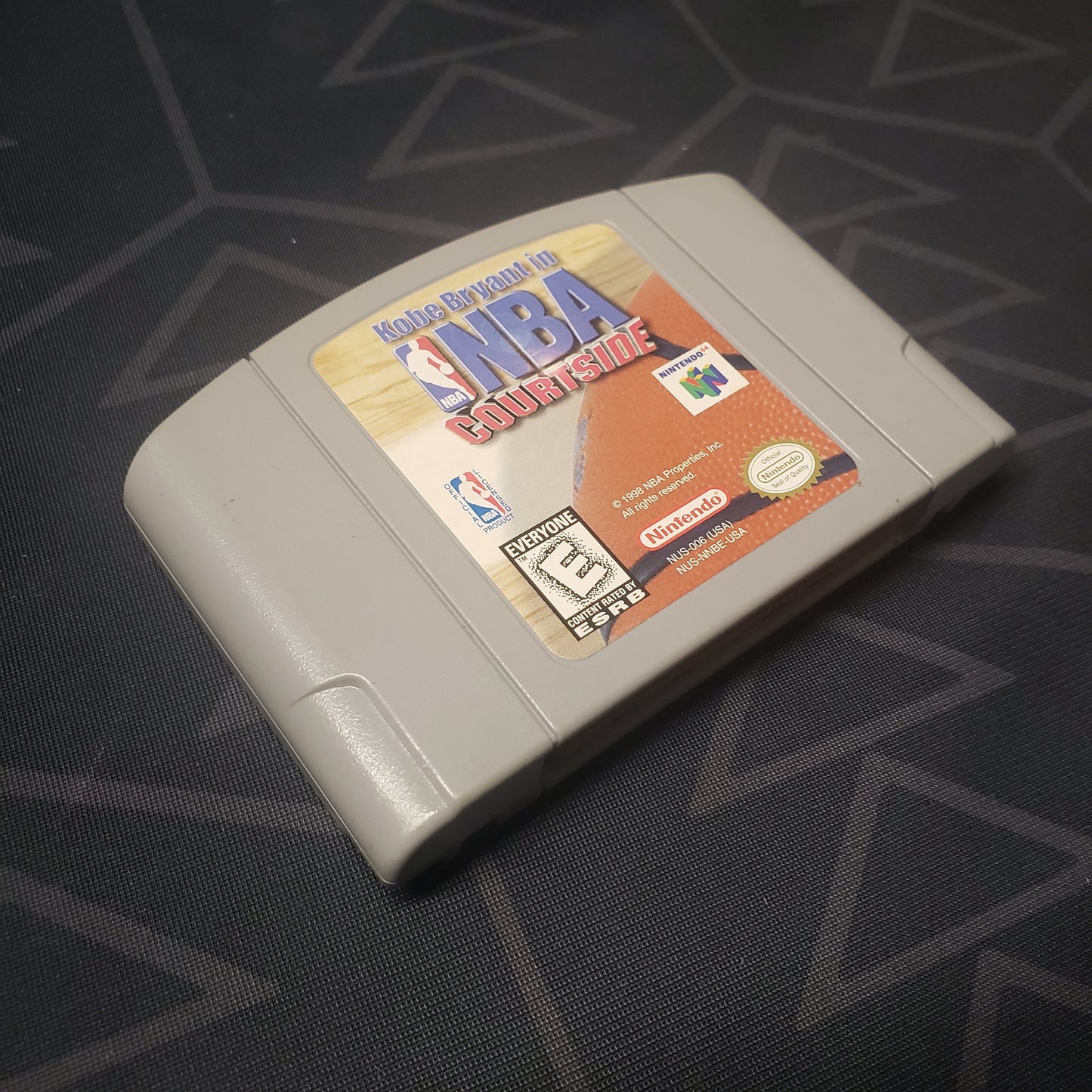 Image shows the front of the cartridge for the video game Kobe Bryant in NBA Courtside for the Nintendo 64