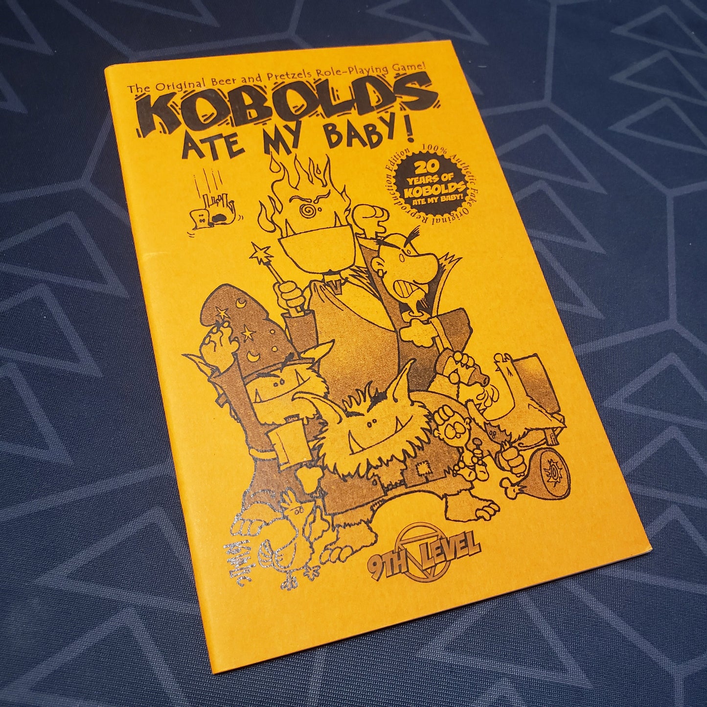 Image shows the front cover of the Kobolds Ate My Baby! (Third Edition, 20th Anniversary Reprint) roleplaying game zine
