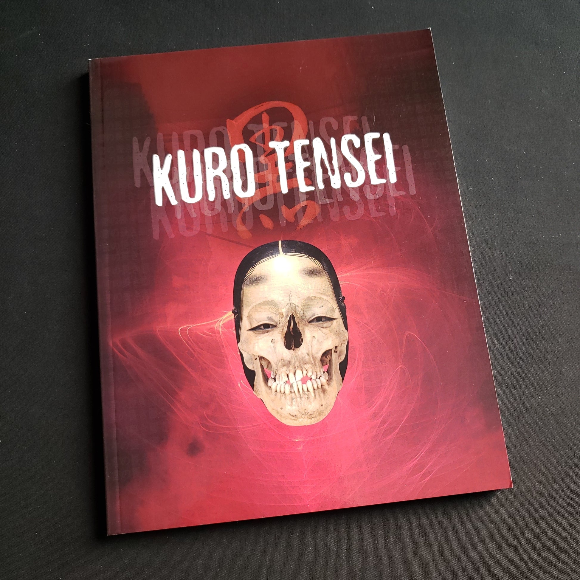 Image shows the front cover of the Kuro Tensei roleplaying game book