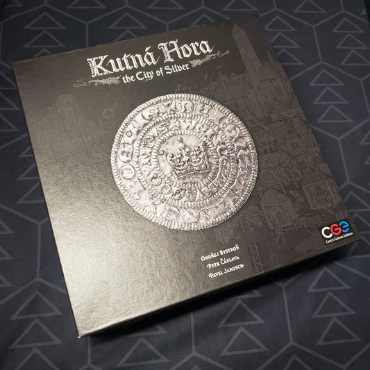 Image shows the front cover of the box for the Kutna Hora: The City of Silver board game