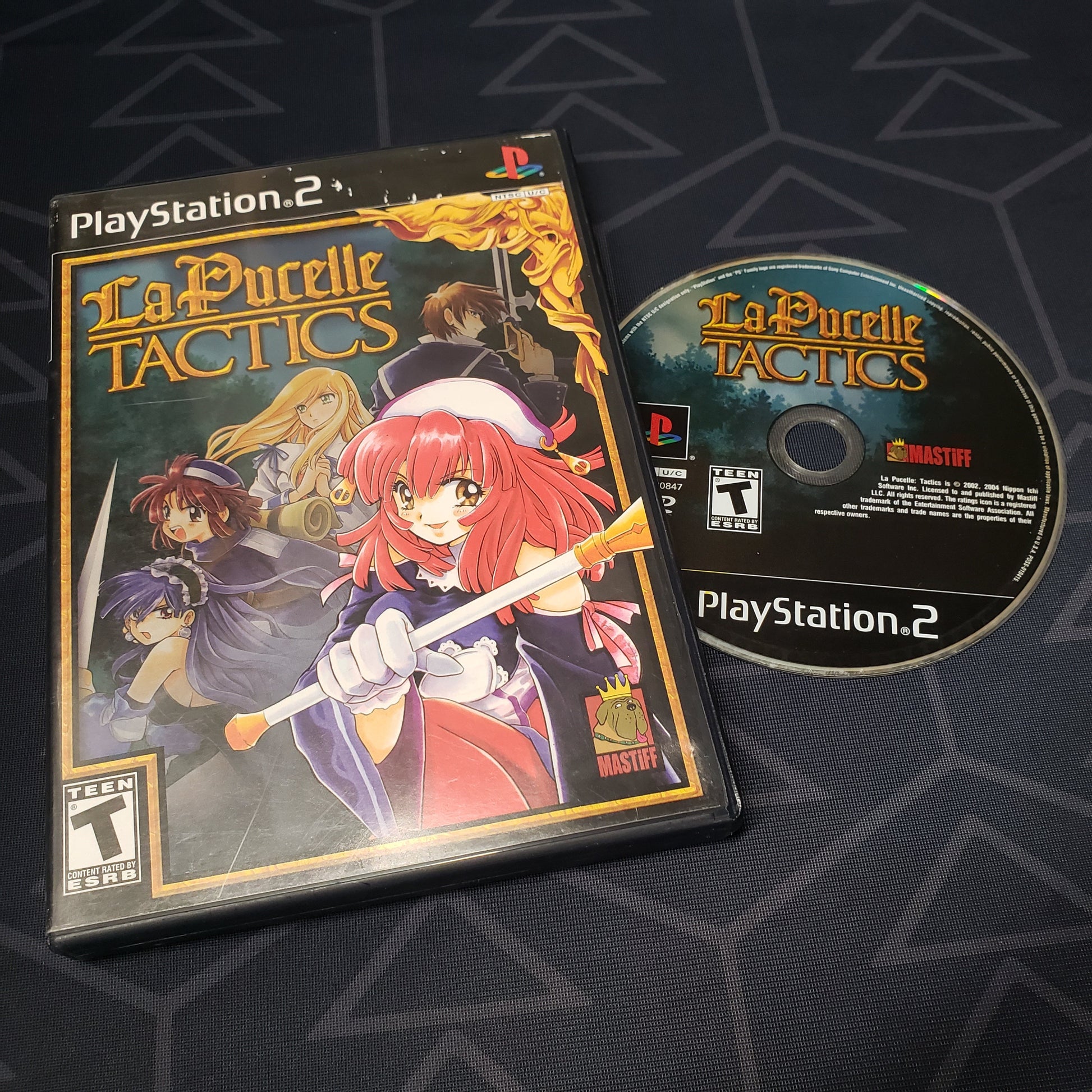 Image shows the case & disc for the video game La Pucelle: Tactics for Playstation 2
