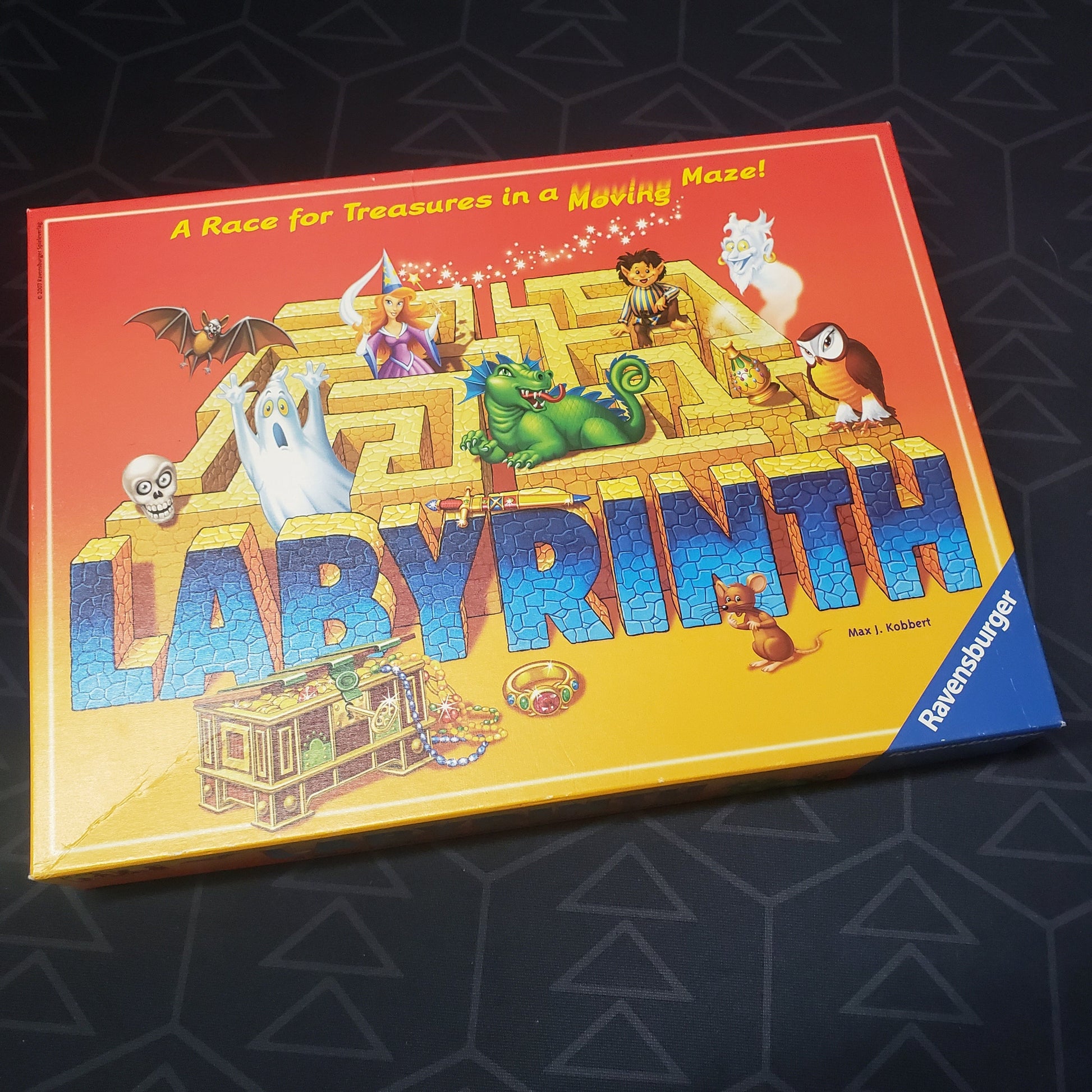 Image shows the front cover of the box for the Labyrinth board game
