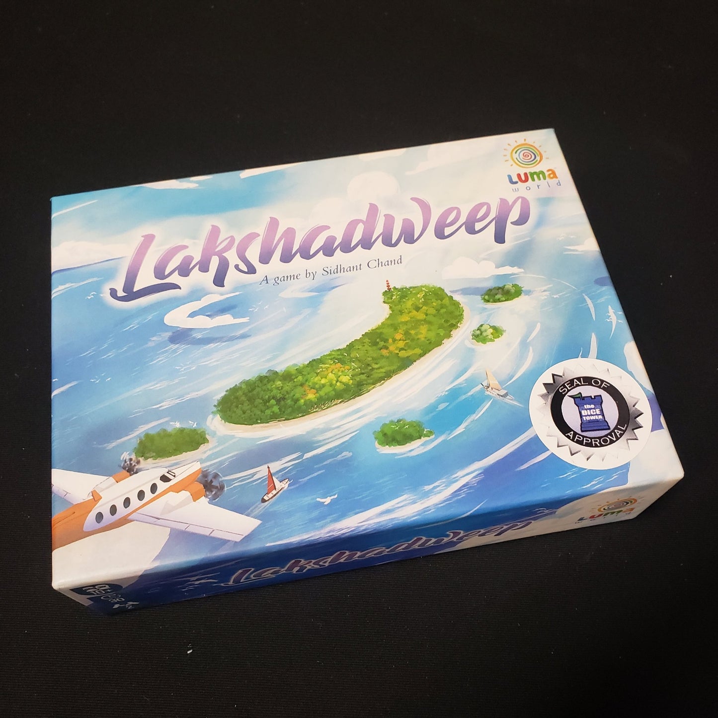 Image shows the front cover of the box of the Lakshadweep board game
