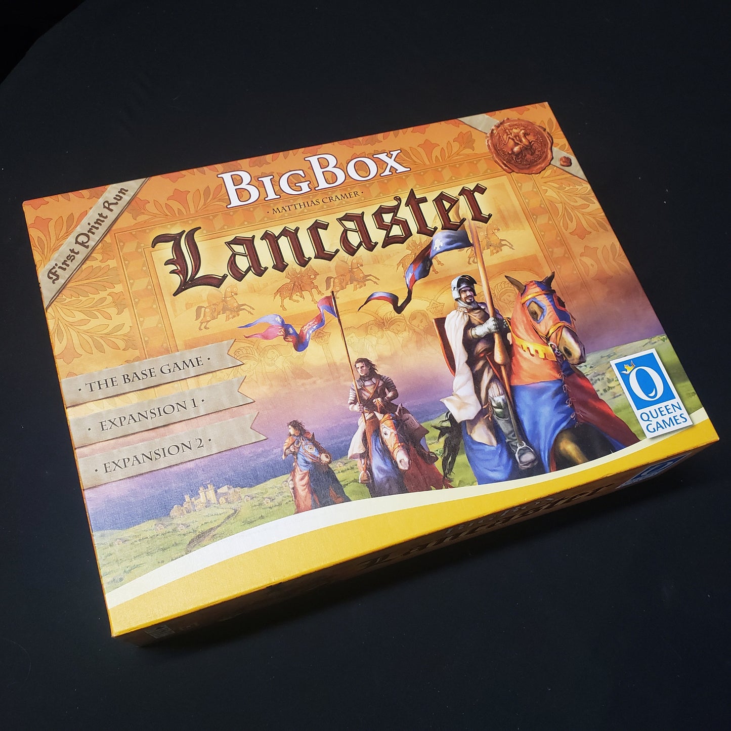 Image shows the front cover of the Big Box edition of the board game Lancaster