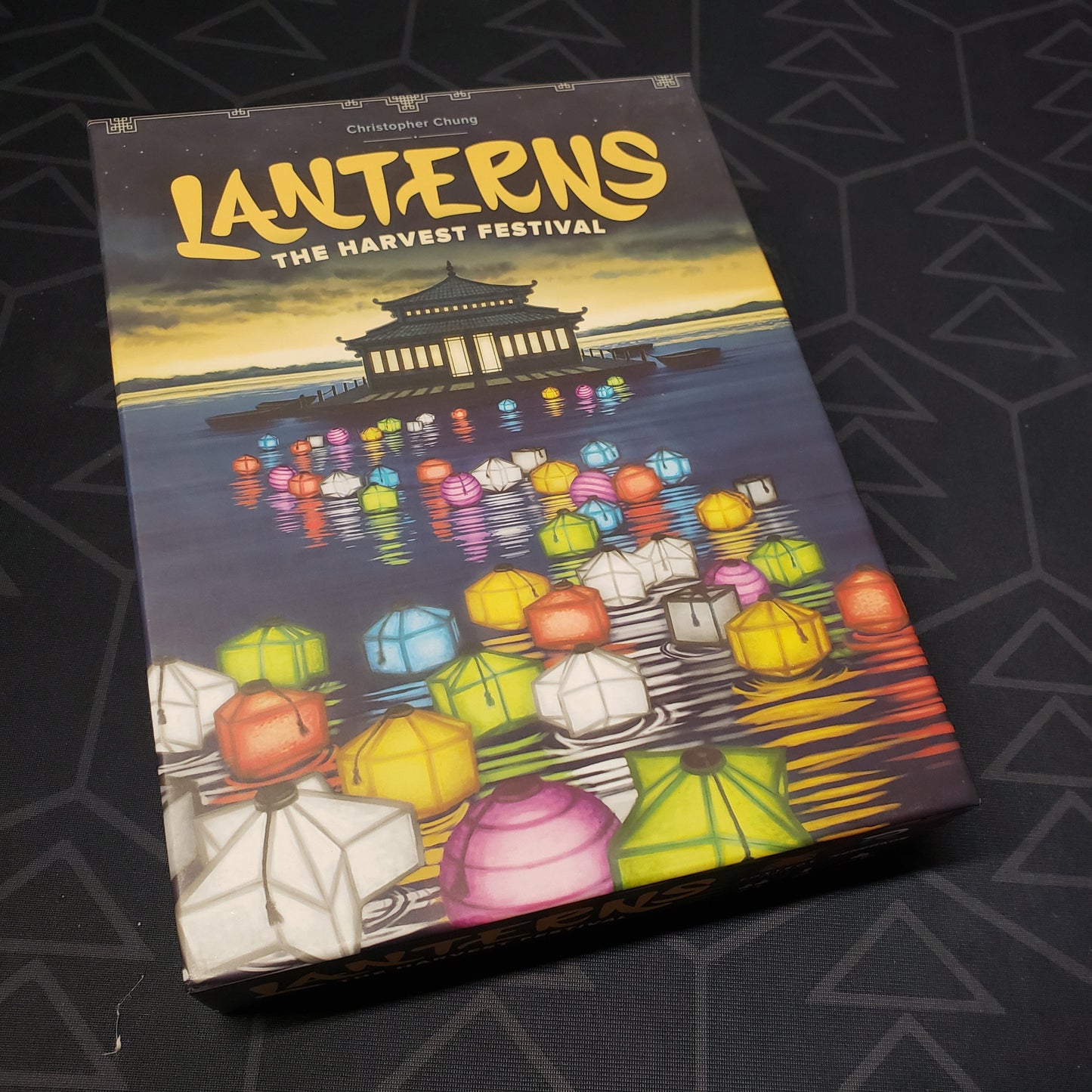 Image shows the front cover of the box for the Lanterns: The Harvest Festival board game