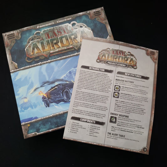 Image shows the box of the Last Aurora board game, with the instructions for the Project Athena expansion sitting on top of it