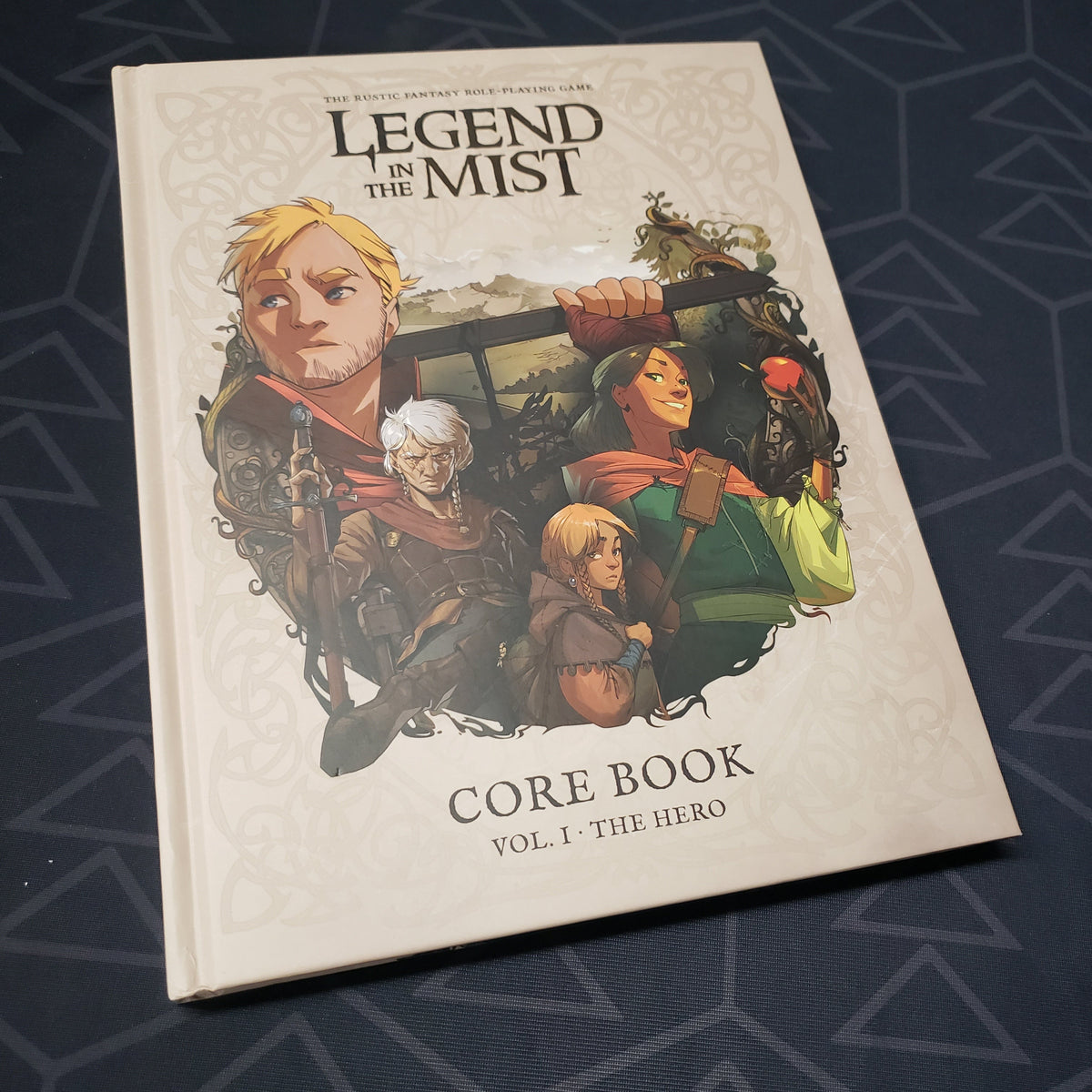 Image shows the front cover of the Core Book Vol I: The Hero book for the roleplaying game Legend in the Mist