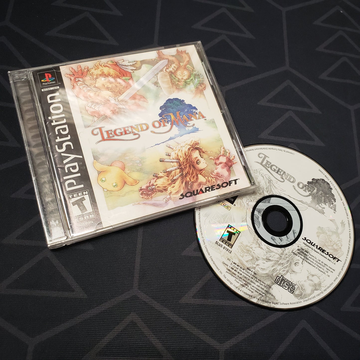 Image shows the jewel case with manual and disc for the video game Legend of Mana for Playstation 1