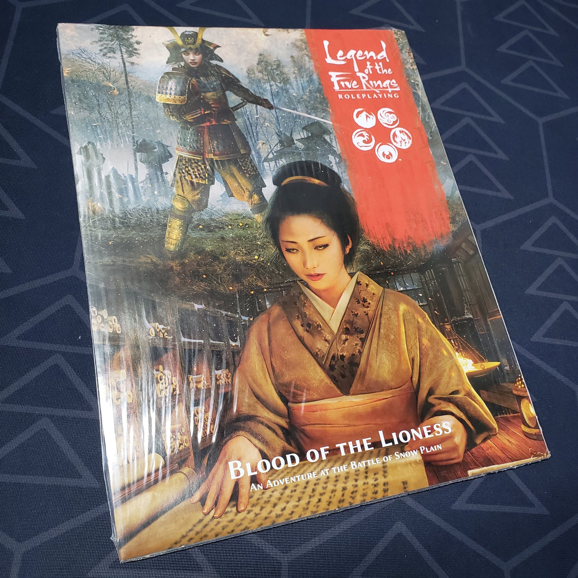 Image shows the front cover of the Blood of the Lioness book for the roleplaying game Legend of the Five Rings: Fifth Edition