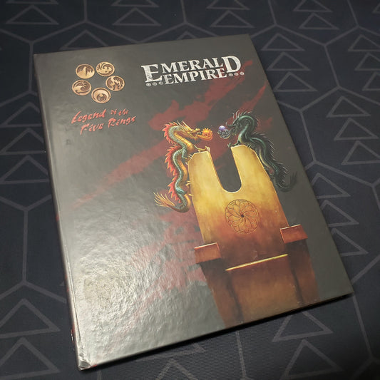 Image shows the front cover of the Emerald Empire book for the roleplaying game Legend of the Five Rings: Fourth Edition