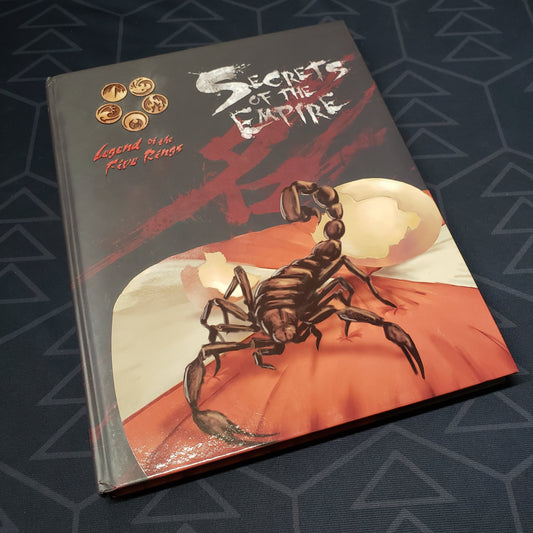 Image shows the front cover of the Secrets of the Empire book for the roleplaying game Legend of the Five Rings: Fourth Edition