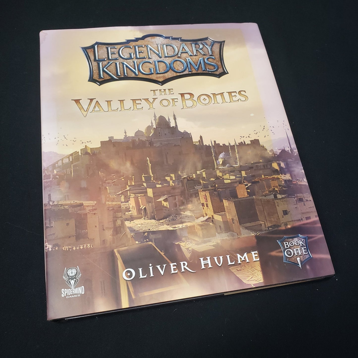 Image shows the front cover of the Legendary Kingdoms: The Valley of Bones roleplaying game book