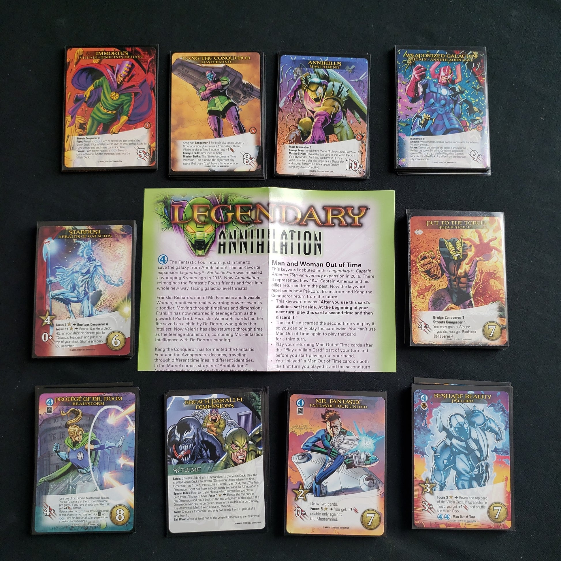 Image shows the instructions & cards arranged in stacks by card type for the Annihilation expansion for the board game Legendary Marvel