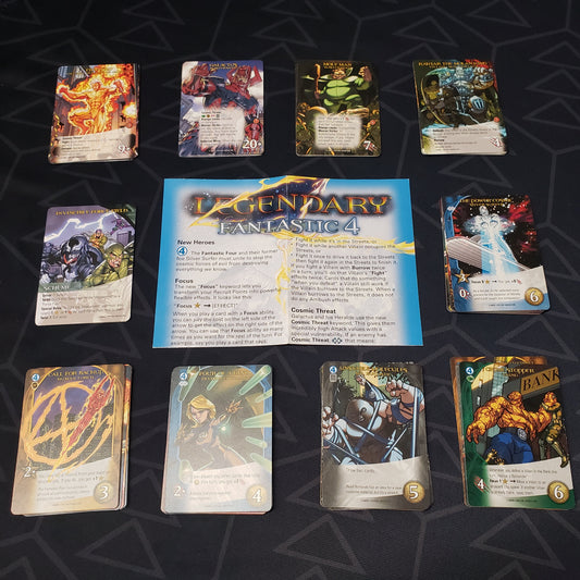 Image shows the instructions and cards for the Fantastic Four expansion for the card game Legendary Marvel