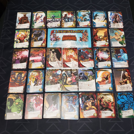 Image shows the instructions & cards arranged in stacks by card type for the Secret Wars Volume 2 expansion for the card game Legendary Marvel