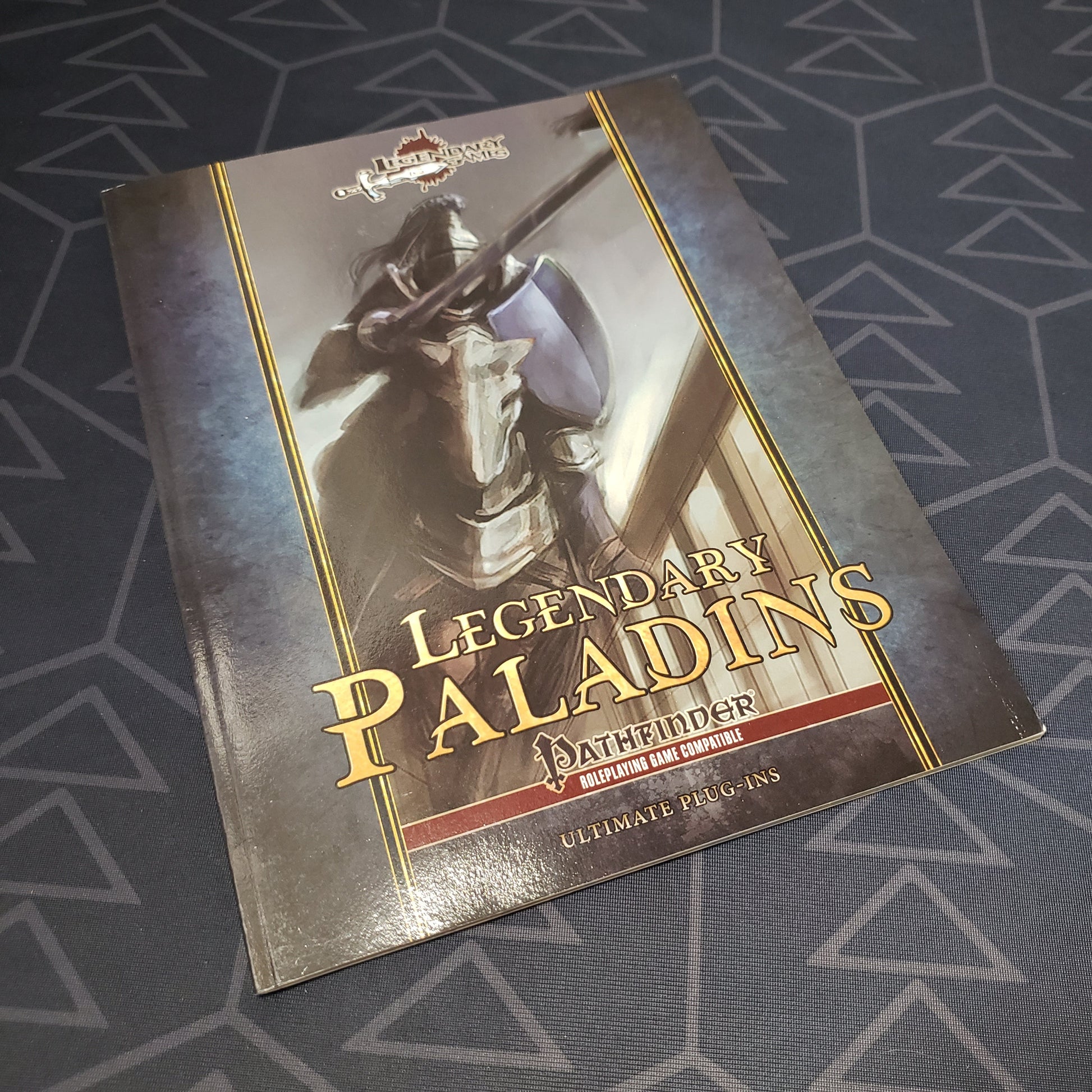 Image shows the front cover of the Legendary Paladins roleplaying game book