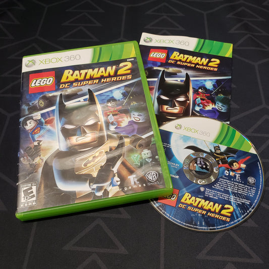 Image shows the case, manual and disc for the video game LEGO Batman 2: DC Super Heroes for Xbox 360