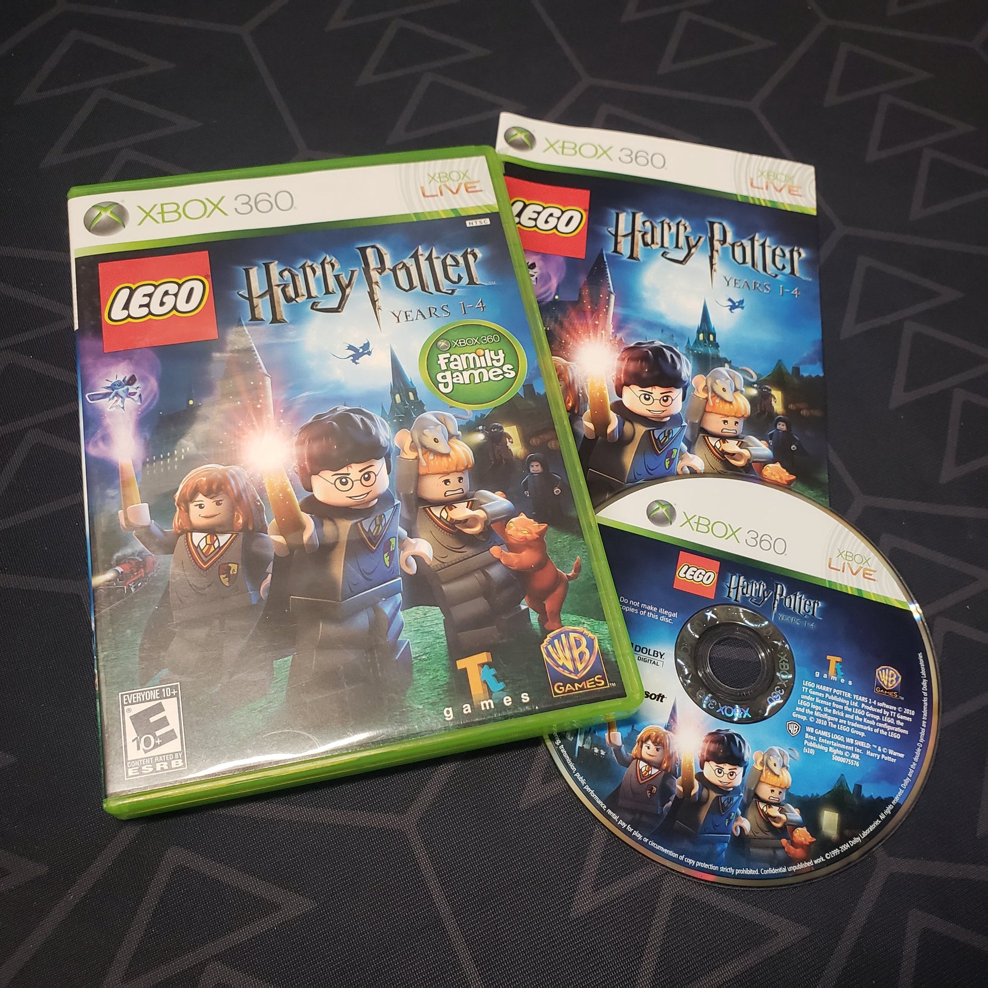 Image shows the case, manual and disc for the video game LEGO Harry Potter: Years 1-4 for Xbox 360