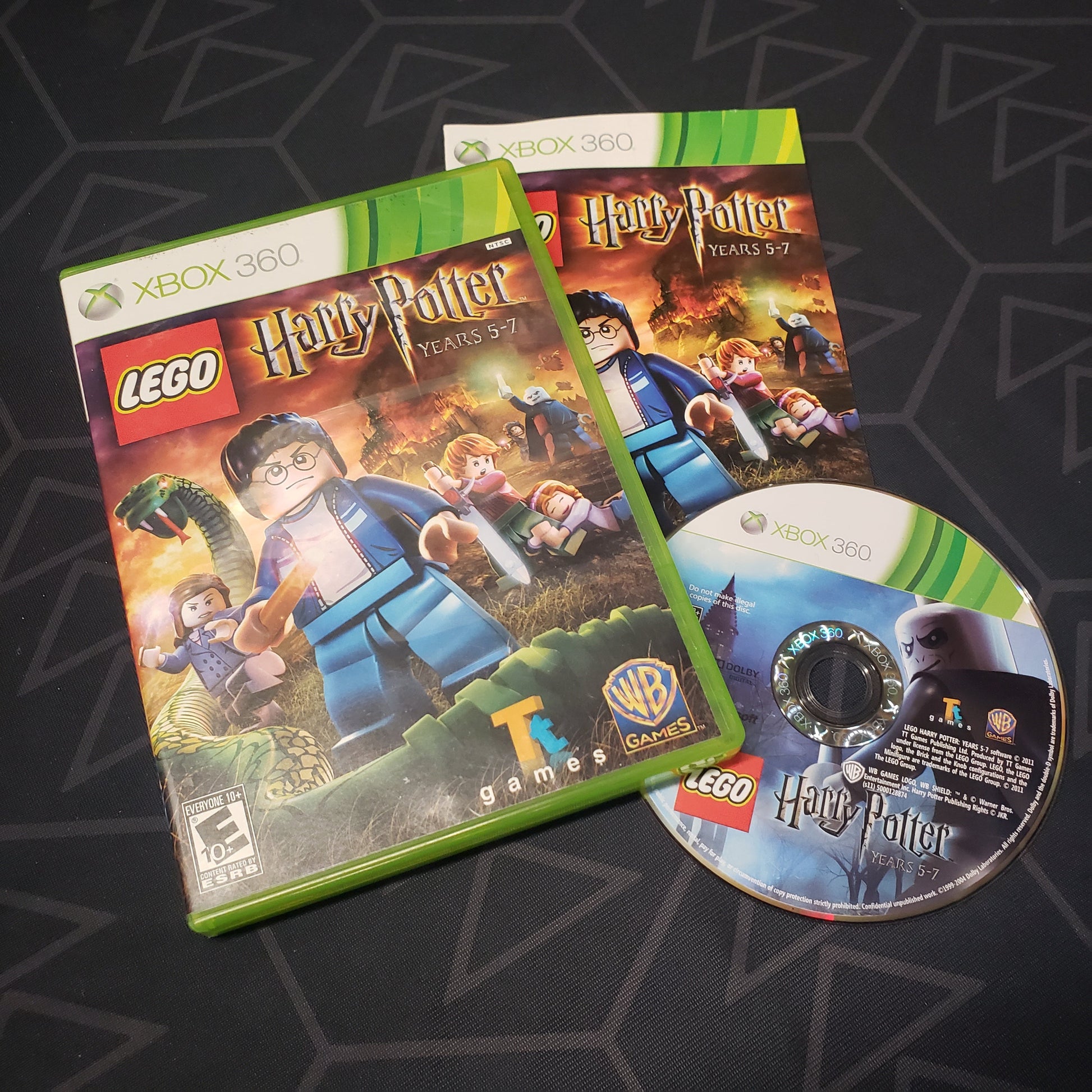 Image shows the case, manual and disc for the video game LEGO Harry Potter: Years 5-7 for Xbox 360