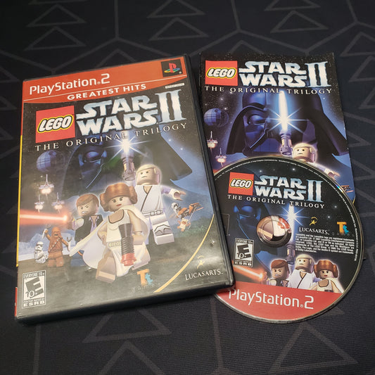 Image shows the case, manual & disc for the video game LEGO Star Wars II: The Original Trilogy for Playstation 2