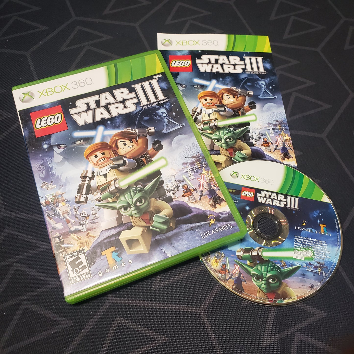 Image shows the case, manual and disc for the video game LEGO Star Wars III: The Clone Wars for Xbox 360