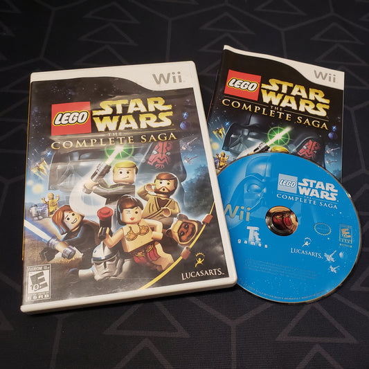 Image shows the case, manual and disc for the video game LEGO Star Wars: The Complete Saga for Nintendo Wii