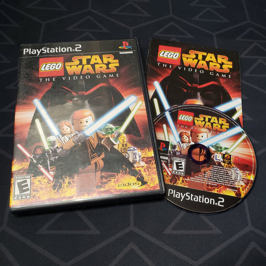 Image shows the case, manual and disc for the video game LEGO Star Wars: The Video Game for Playstation 2