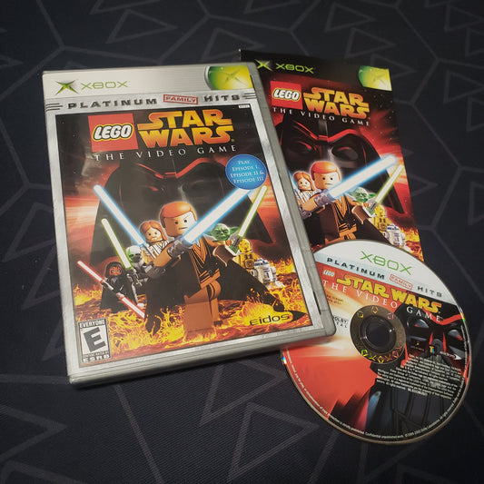 Image shows the case, manual and disc for the video game LEGO Star Wars: The Video Game for the original Xbox